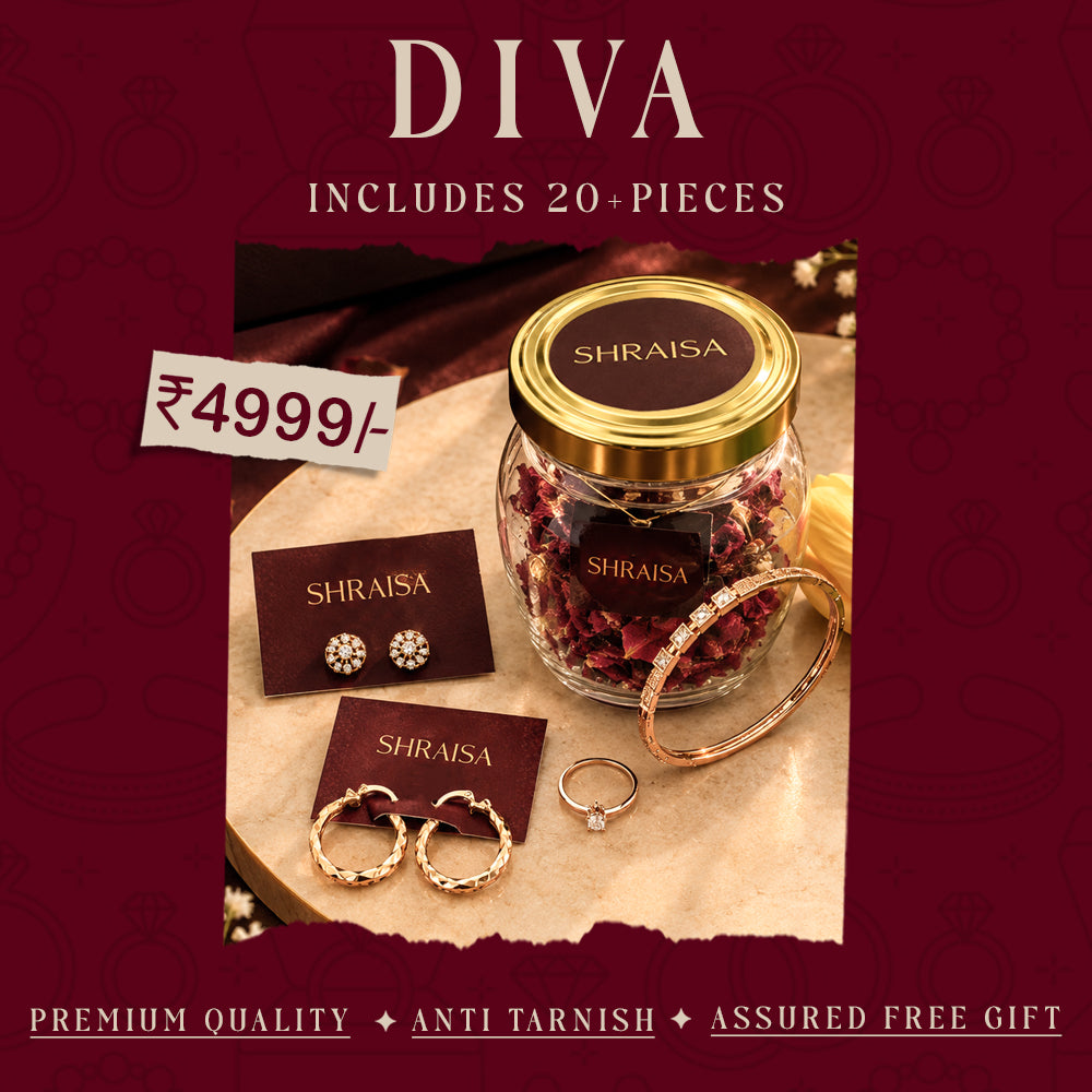 Promotional product graphic for a DIVA jewelry set by SHRAISA, featuring a glass jar of dried rose petals with a gold lid, a pair of stud earrings on a card, a pair of hoop earrings, and a ring, all branded SHRAISA. The set is presented on a torn-paper style beige background with a dark burgundy graphic backdrop, with text indicating it includes 20+ pieces and a price of ‚₵4999/-”.