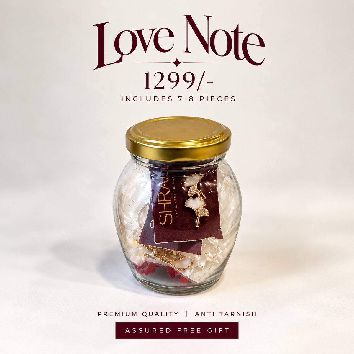 A glass jar with a gold lid containing wrapped gift pieces, centered on a white background with promotional text reading 'Love Note 1299/-' and 'Includes 7-8 pieces.'.
